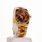 Arany színű női óra tigris csíkokkal és római számos számlappal - Ékszer Galéria