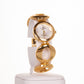 AW arany színű női óra végtelen szimbólomú szíjjal és 4 kvrackristállyal - Ékszer Galéria